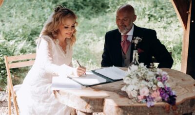 a couple signing the marriage register