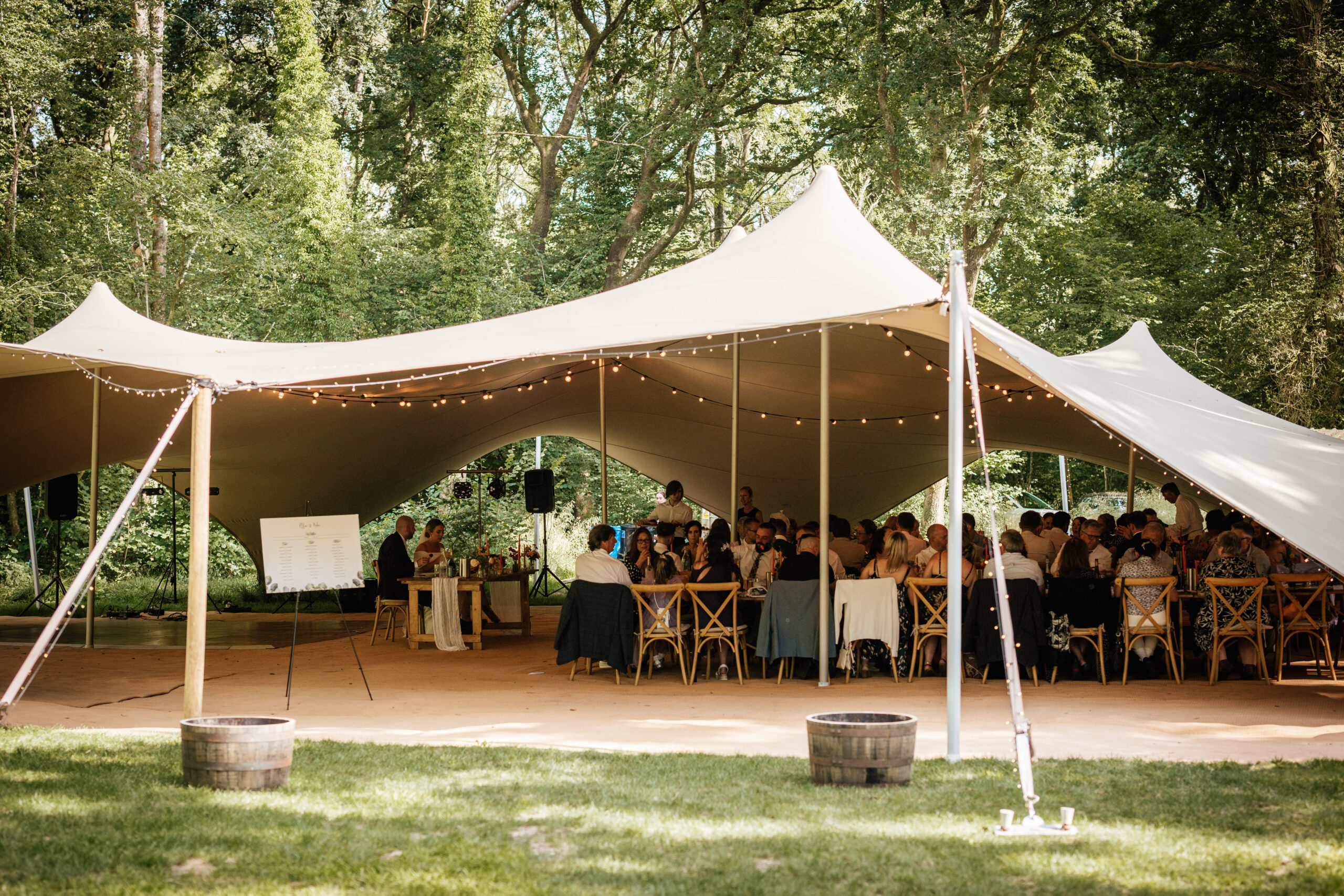 a stretch canvas in a woodland for a wedding