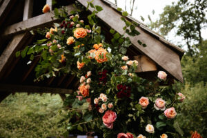 flowers decorating an oak arbour