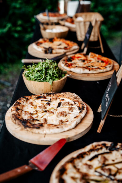 pizzas on a buffet table